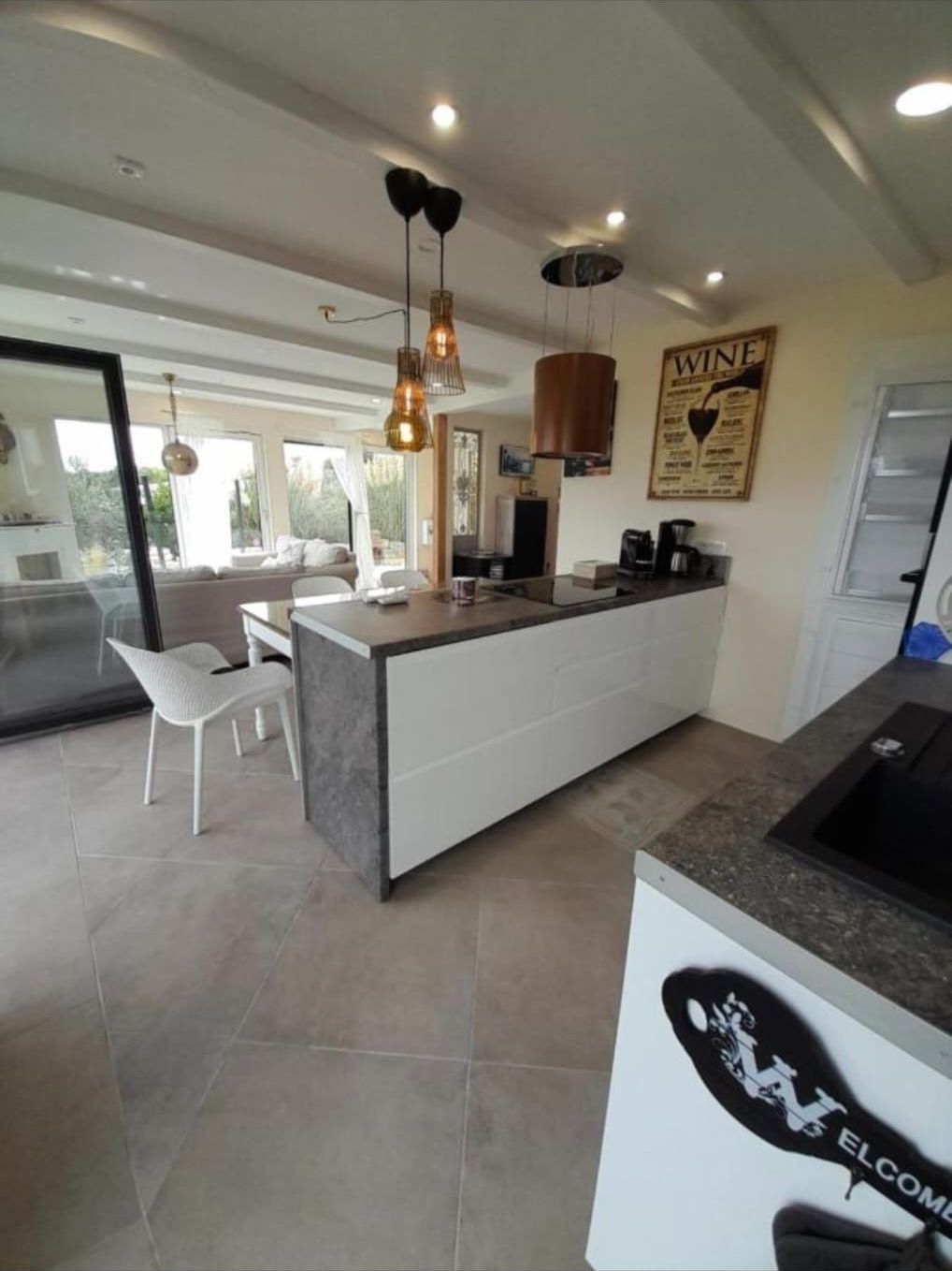 Open kitchen with island and living area