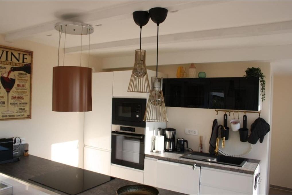 Kitchen unit with oven, microwave and coffee machine