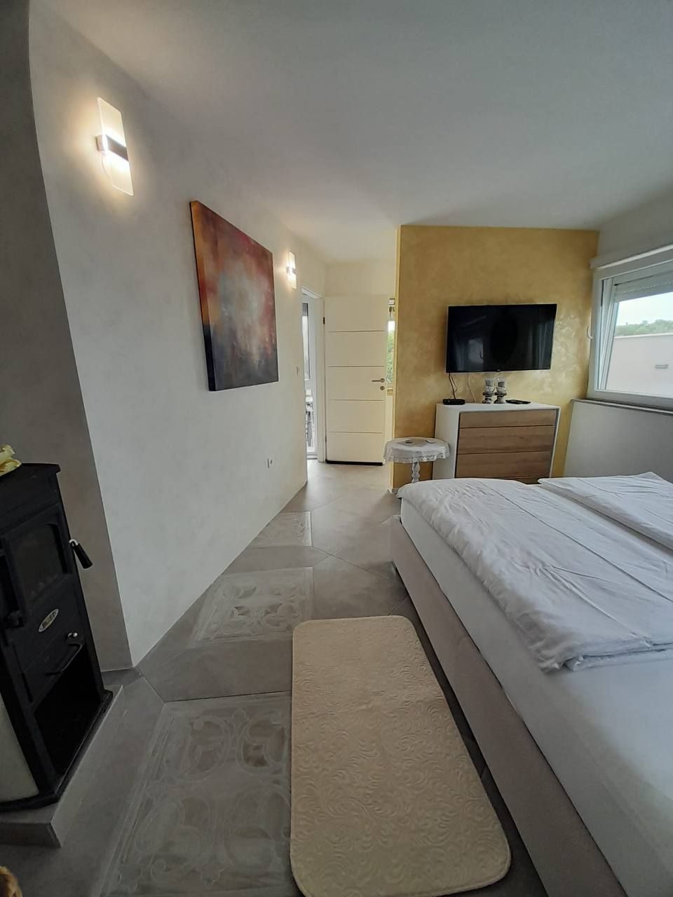 Bright bedroom with double bed